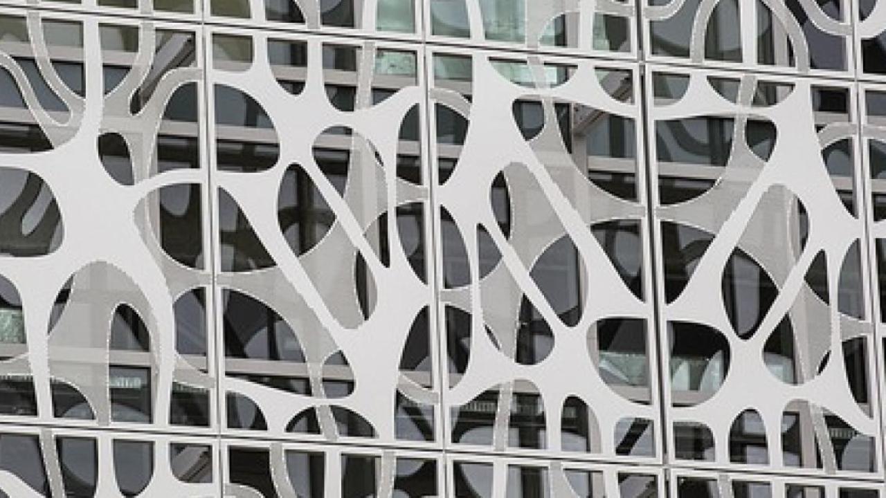 Modern building facade with abstract screen